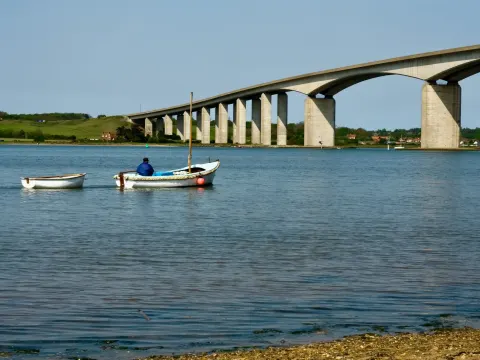 Small boat heading toward the Orwell Bridge