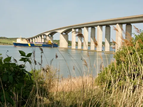 Ship on the Orwell, just going under the Orwell Bridge